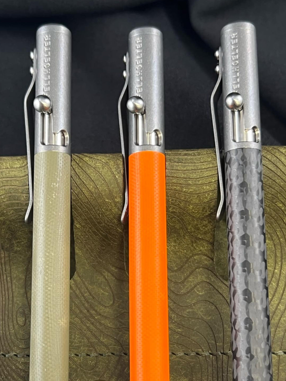 Full Size TiBolt, New Grip Design, G10 and Carbon Fiber